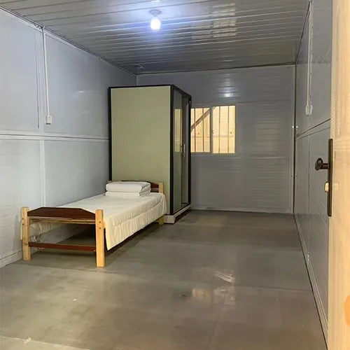 Small room with a bed and a closet.