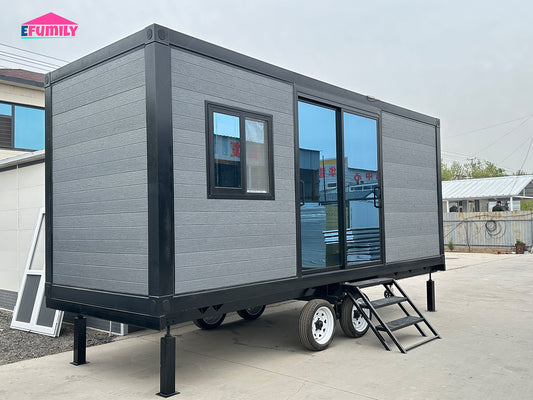 Modular building on wheels with EFUMILY branding in the background